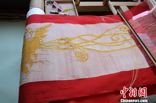 纬线约14万根，寓意14亿中华儿女同心共筑中国梦 遂昌提供 摄