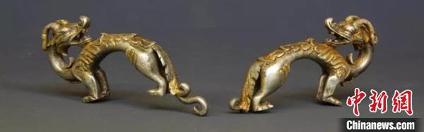 中蒙联合考古在蒙古国境内匈奴贵族墓中首次发现单体龙形器物