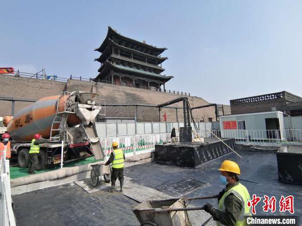 平遥古城“疫后”抢时间重塑“地下经络”?！±钚滤?摄