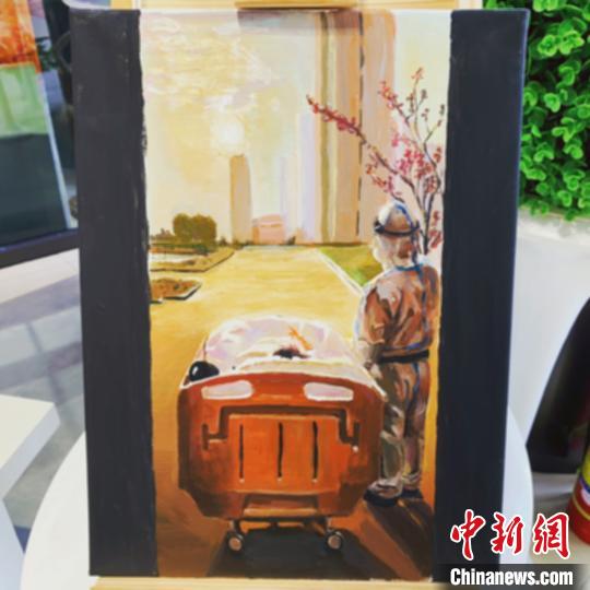 医护人员陪同患者看夕阳的照片被宁夏画师创作成为油画作品?！±钆迳?摄