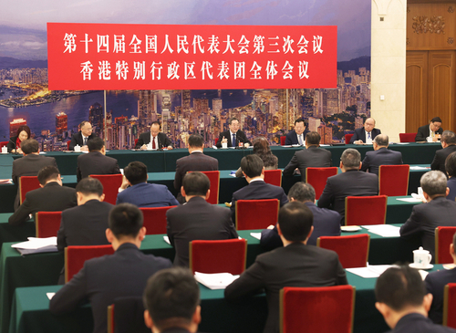 3月7日上午，中共中央政治局常委、国务院副总理丁薛祥参加十四届全国人大三次会议香港代表团审议。新华社记者 刘卫兵 摄