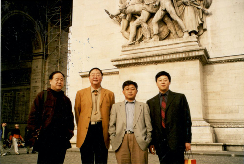 2004年随中国作协代表团访法 左一莫言(7173797)-20250512093117