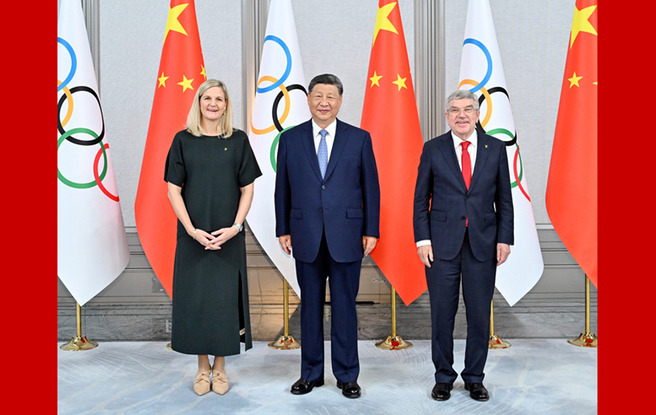 习近平会见国际奥委会主席考文垂和终身名誉主席巴赫