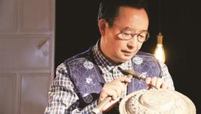 一锤一錾总关情 