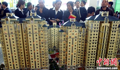 七问房地产税：开征还有多远？你会多交钱吗？